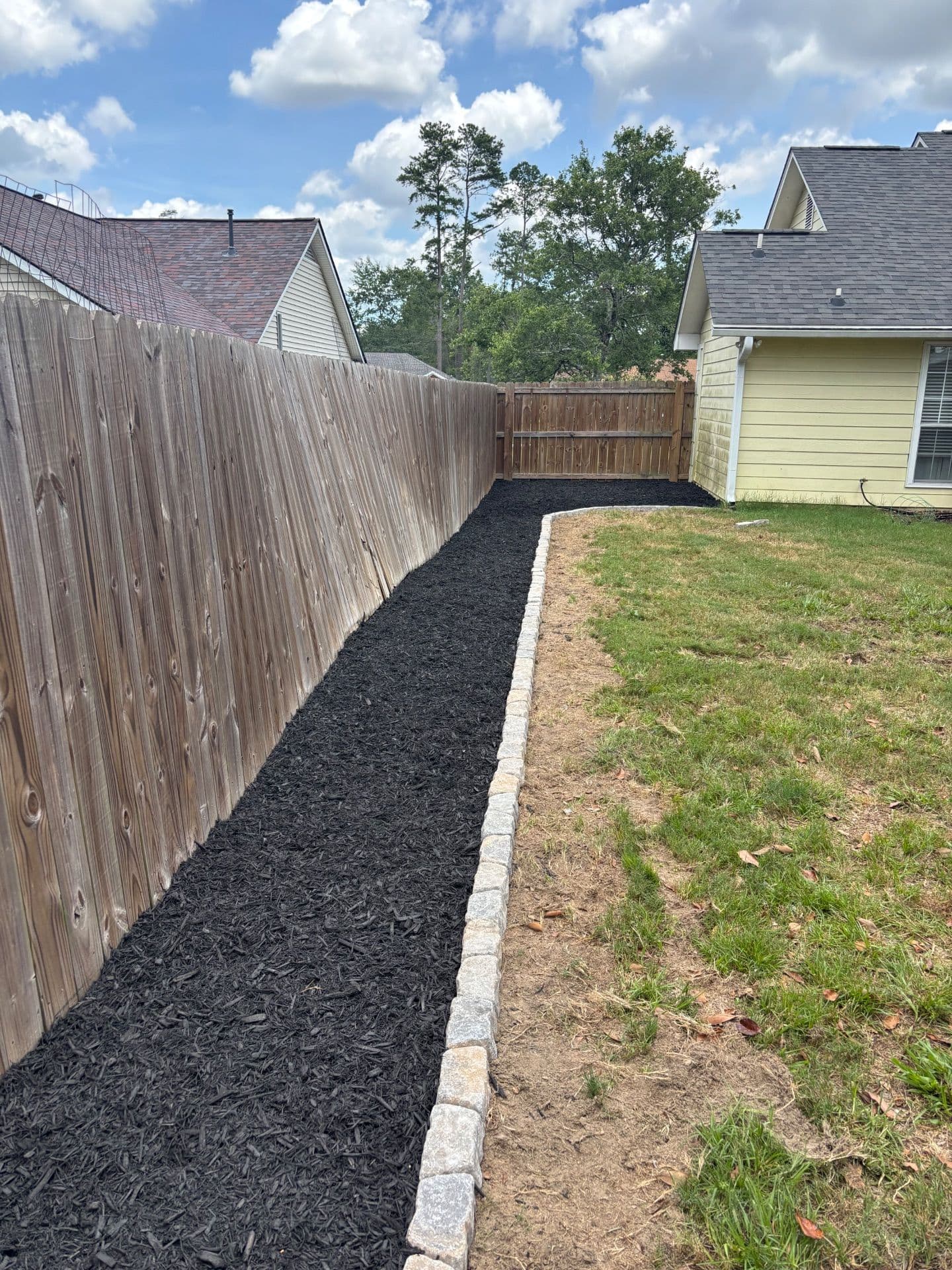 Transforming Backyards with Elegant Mulch Beds image