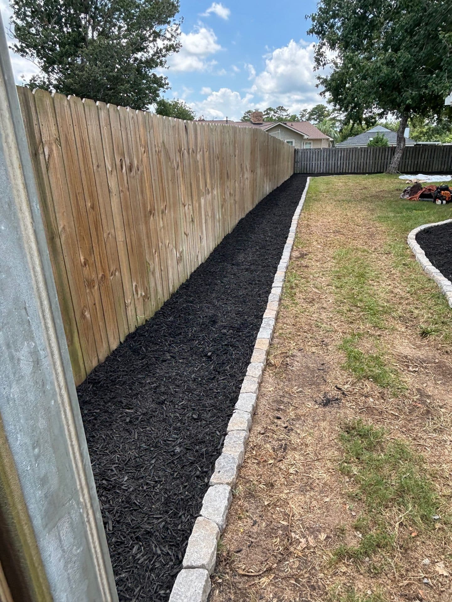 Gallery photos for Transforming Backyards with Elegant Mulch Beds: Image #2