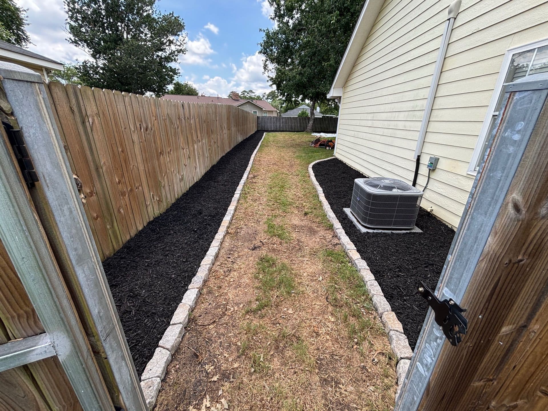 Gallery photos for Transforming Backyards with Elegant Mulch Beds: Image #5
