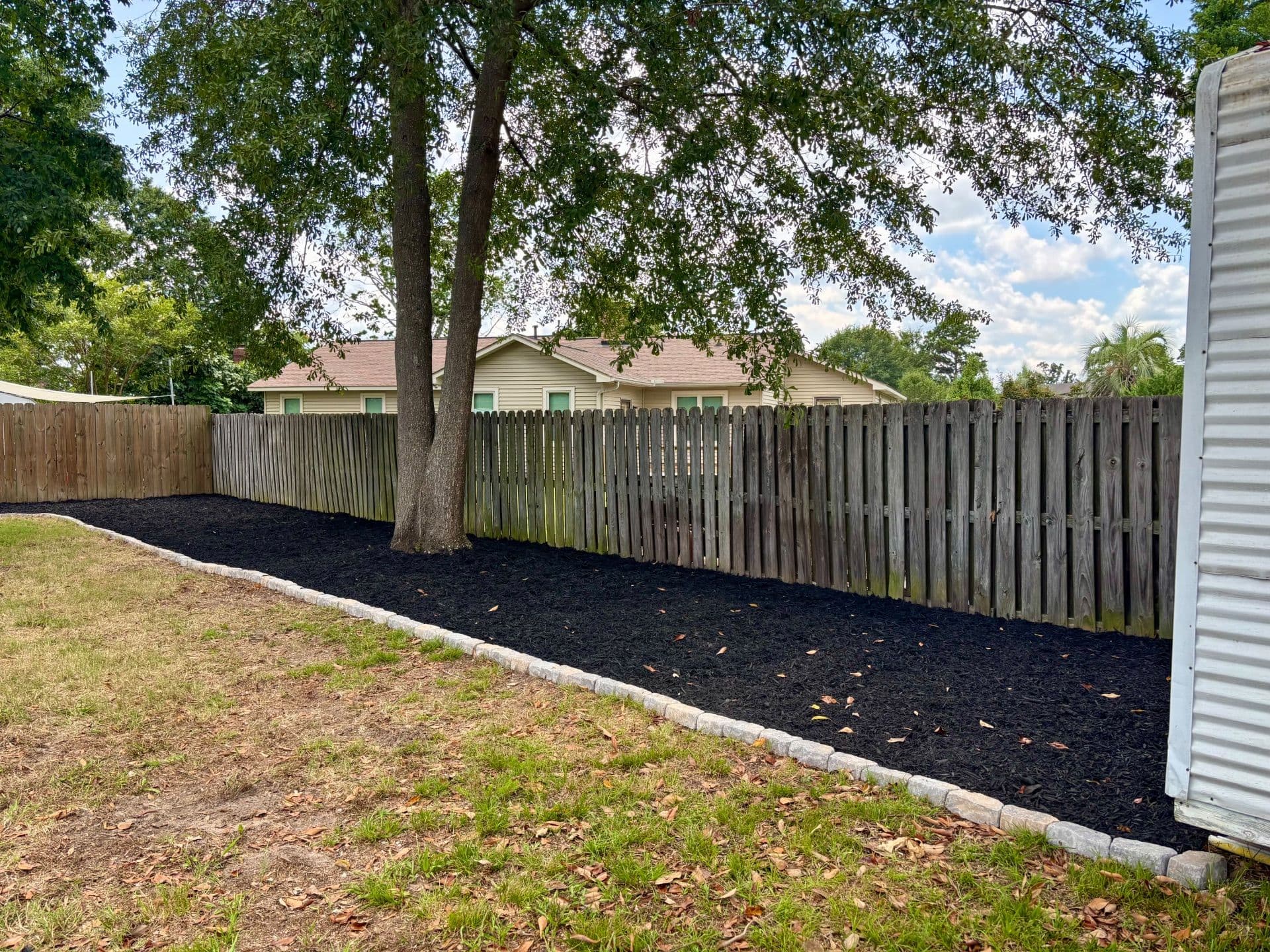 Gallery photos for Transforming Backyards with Elegant Mulch Beds: Image #8