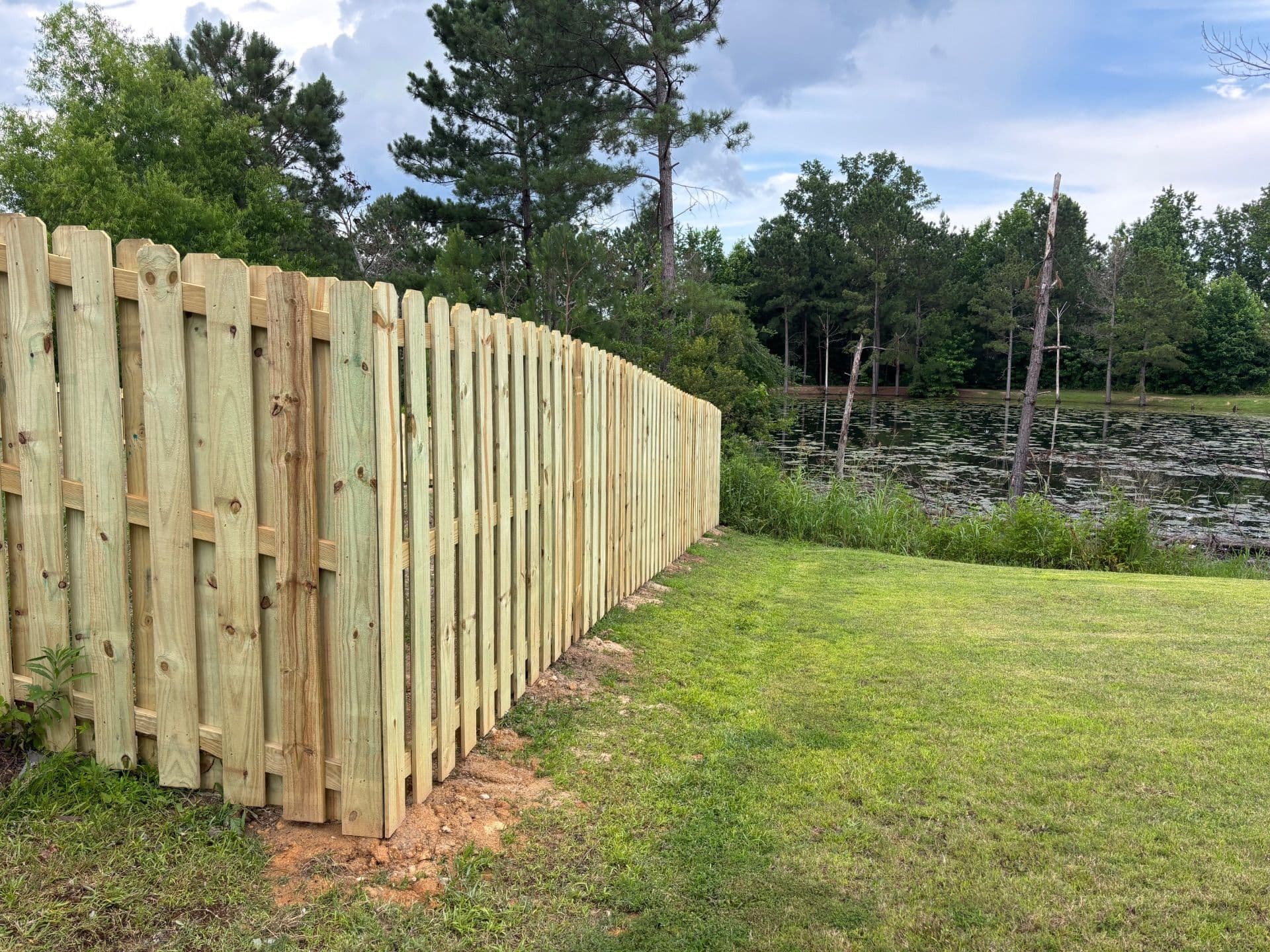 Stunning Shadowbox Fence by the Pond image