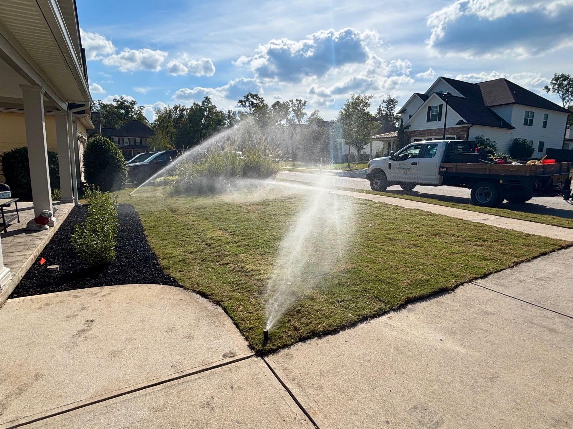 Stunning Lawn Transformation with Sod Installation and Irrigation image