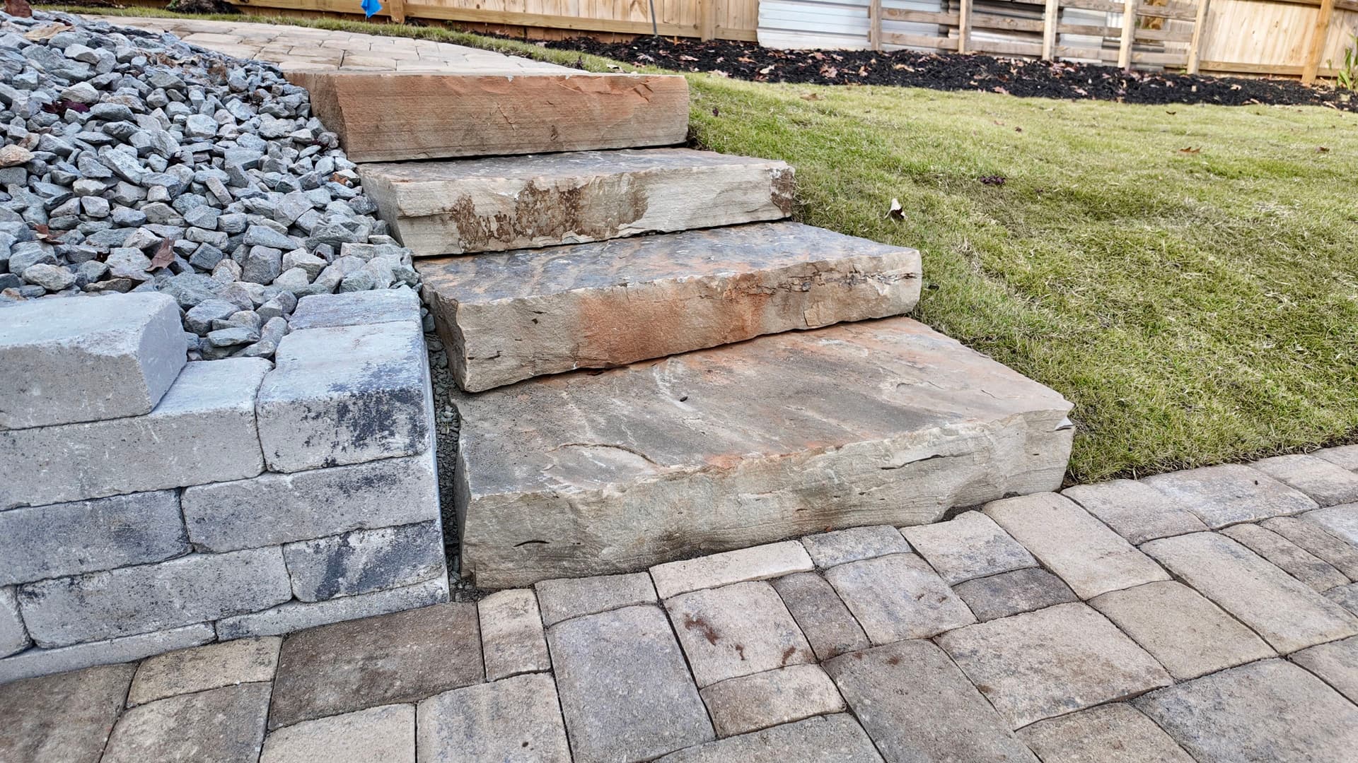 Natural Stone Steps and Paver Patio Installation