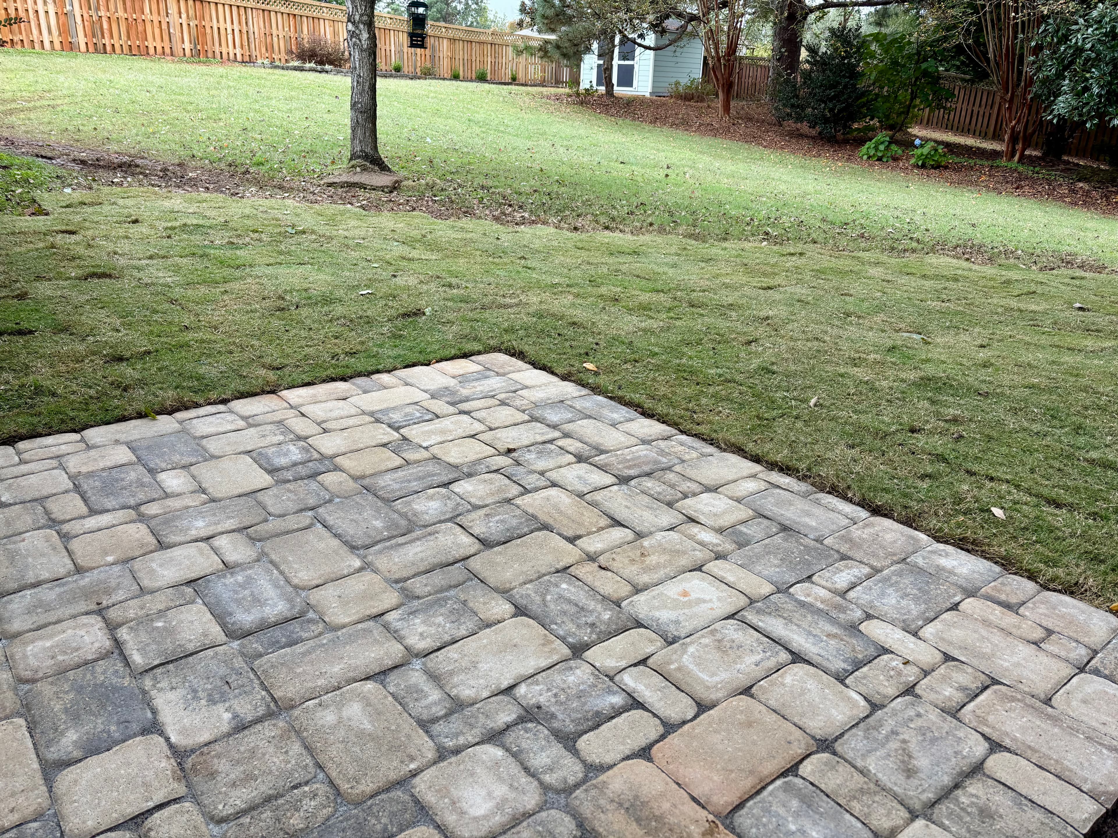 Project Cobble Patio and Lush Lawn Makeover image