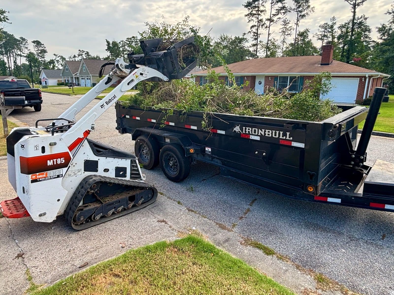 Project Yard Clean-Up Made Easy with Our Skid Steer image