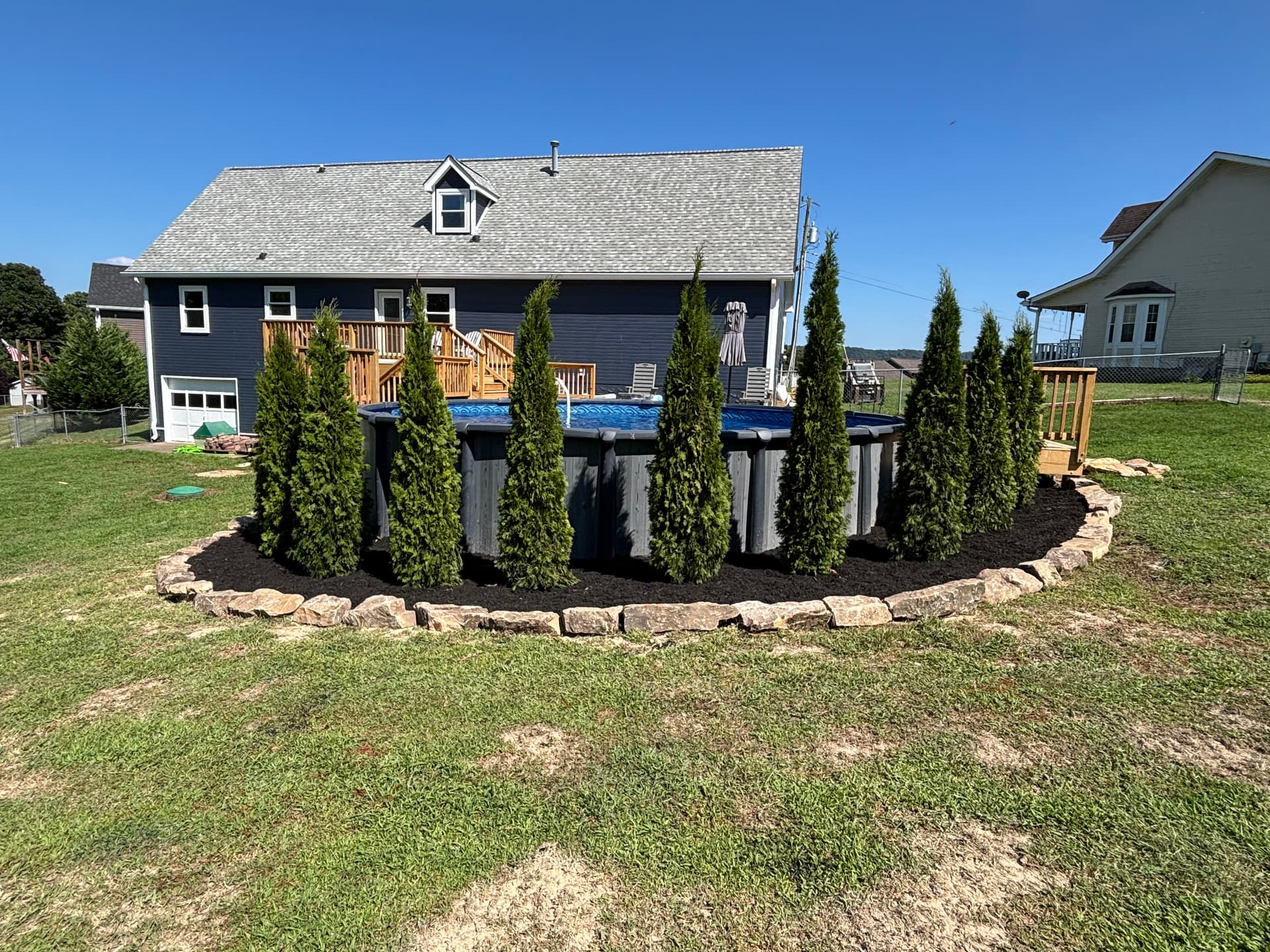 Gallery photos for Boulder Wall, Fresh Plantings and Pool Privacy Screen in Ringgold: Image #3