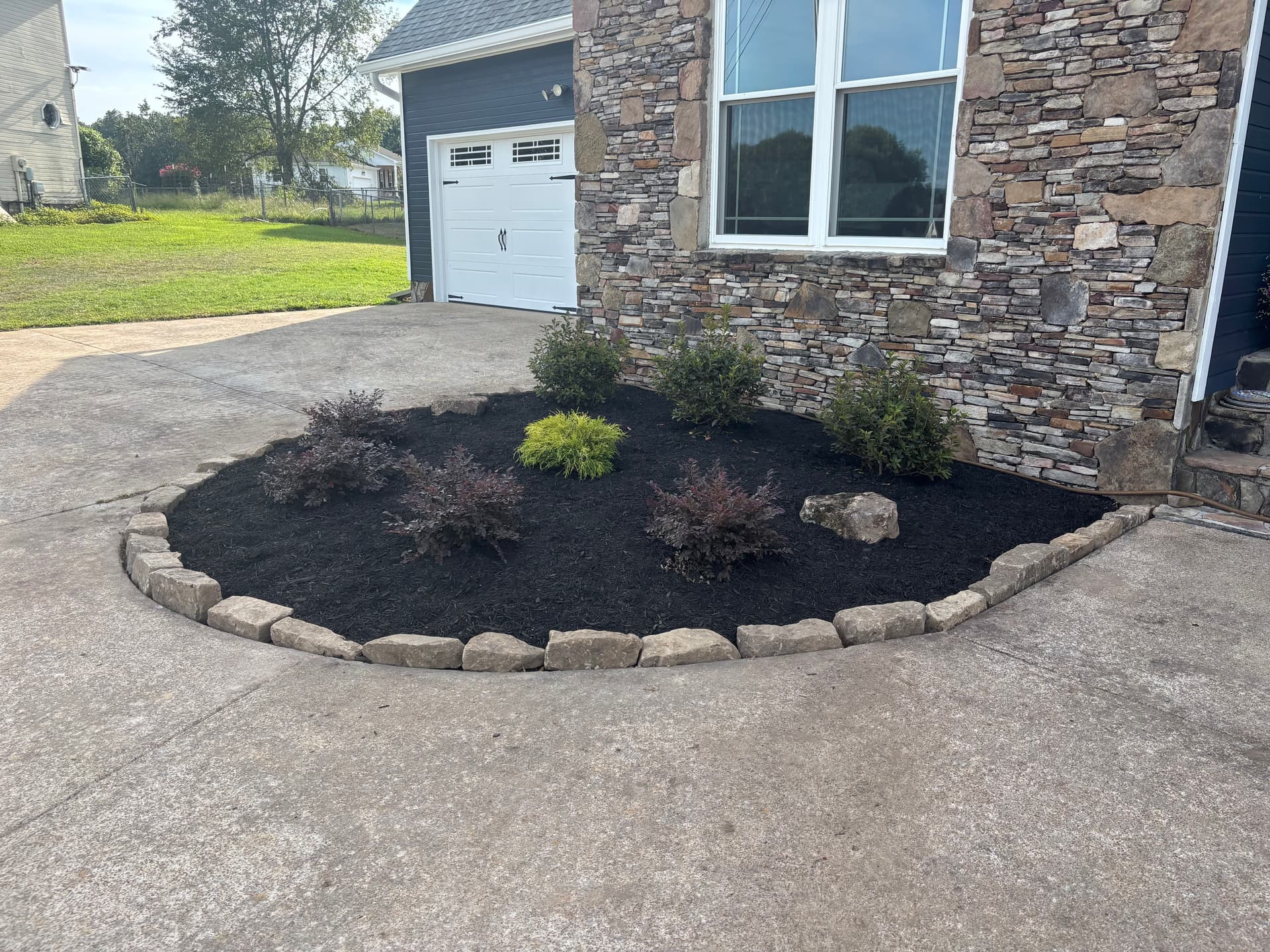 Gallery photos for Boulder Wall, Fresh Plantings and Pool Privacy Screen in Ringgold: Image #1